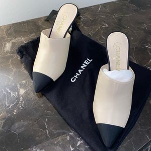Black and nude Chanel mules